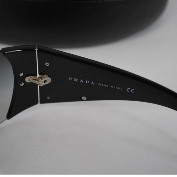 Brand: Prada
Model: SPR 16H 1AB-5D1
Color: Black frame with gradient lenses - Picture 6 of 8